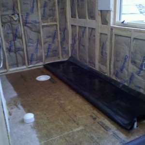 Lining a bathroom for tile. I'm supposed to be a roofer?!