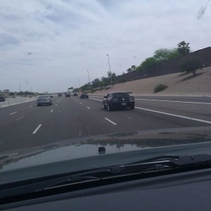 Mustang with a wing on eastbound 202