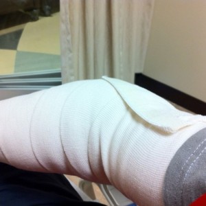 Fresh out of elbow surgery sitting in recovery.