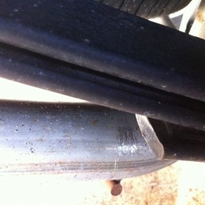 Gouges where the leafs hit the exhaust pipe when hauling mulch.