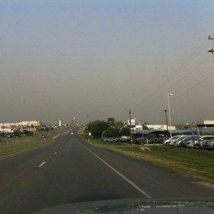 Smoke from a fire about 200 miles away, smells like a big BBQ.