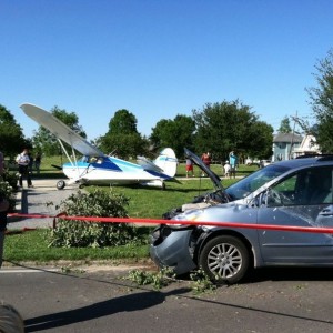 A small plane crashed into a Toyota Sienna.