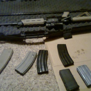 Cleanin my gun and loading some mags :D