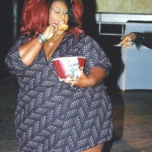 000946-fat-overweight-black-woman-with-huge-red-hair-eating-kfc-chicken