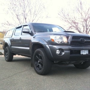Did work today... Plasti-Dipped rims and valance, removed "SPORT"