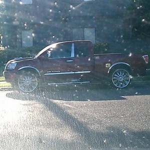 Sick! Look at all that chrome! And look at those rims!! bahahaha