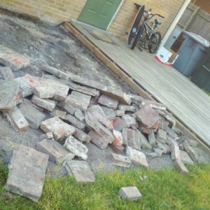 Demolition for a new paver patio. Didn't know there was a layer of bri