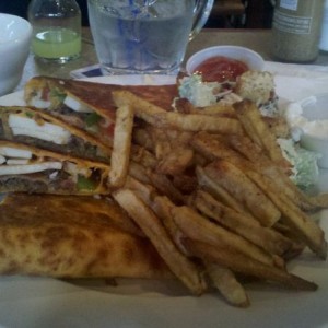 Quesadilla with chicken and beef and bacon, fries and caeser