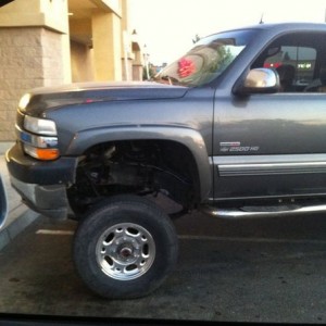 Takes up 2 spots right in front of a Redbox kiosk. Fuckin idiot!
