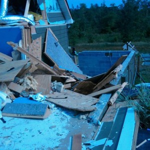 The wall w/siding used to sit up on block wall 8' away, until tornado 