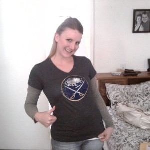 My wife and her new shirt...she was sad they got eliminated but excited tha