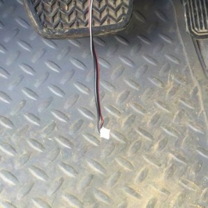 wire hanging under dash