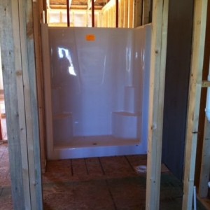 :woot: plumbing and showers in!
