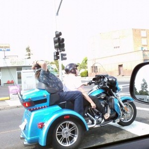 That is a chick drivin with her man on the back...