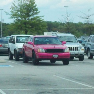 Yes its a hot pink cadillac. The rims on the driverside matched the rest of