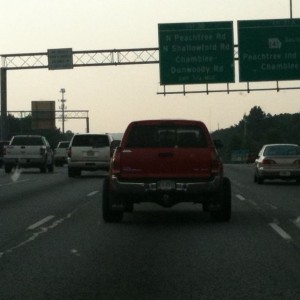 No those are not wheel spacers or a duelly, it's really wide rims, jus