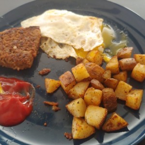 Leftovers for breakfast (sorry no virgin shots, only busted yolks here).