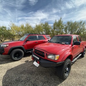 2015 Custom 4Runner and 2003 Custom Toyota Tacoma (Cherry Bomb)