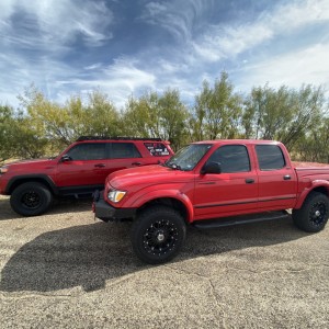 2015 Custom 4Runner and 2003 Custom Toyota Tacoma (Cherry Bomb)