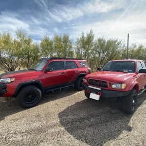 2015 Custom 4Runner and 2003 Custom Toyota Tacoma (Cherry Bomb)