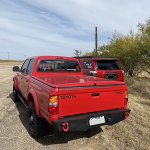 2015 Custom 4Runner and 2003 Custom Toyota Tacoma (Cherry Bomb)