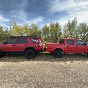 2015 Custom 4Runner and 2003 Custom Toyota Tacoma (Cherry Bomb)