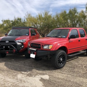 2015 Custom 4Runner and 2003 Custom Toyota Tacoma (Cherry Bomb)