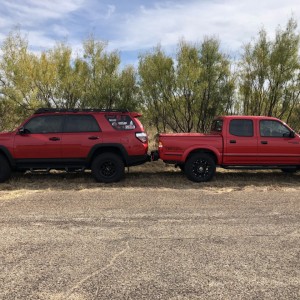 2015 Custom 4Runner and 2003 Custom Toyota Tacoma (Cherry Bomb)