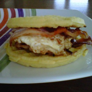 Mmmmm healthy breakfast... 4 pieces of bacon and a over easy egg on 2 eggo 