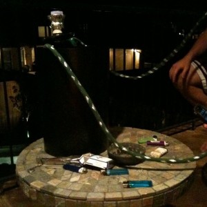 Smokin hookah outta a trash can. Vase has a hair line crack, put water in t
