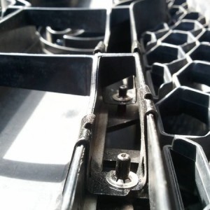 TRD emblem mounting brackets