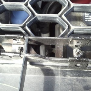 TRD emblem mounting brackets