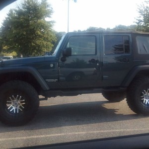 Jeep on 37s...no.spare again haha. Look whats in its reflection haha Sent f