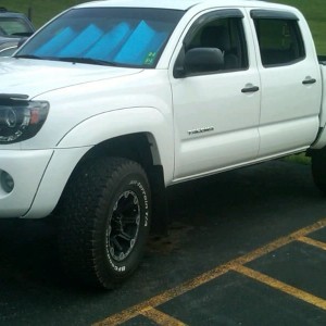 Lady at work drives this! Same wheels as mine...projector headlights...285/