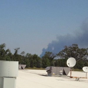 On the roof at work...plastic plant on fire