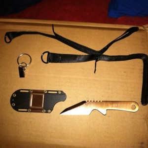 Knife sleeve with a clip. And 2 wrist straps