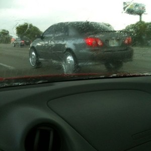 Homeboy pushin a corrolla on dub dueces!