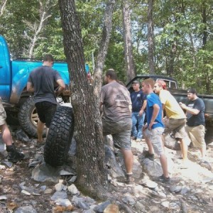 How many dunbasses does it take to change a tire?