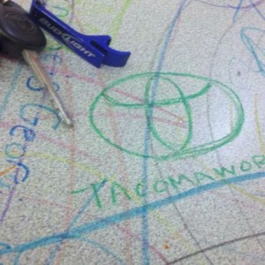 Coloring on a table at old navy with the niece's ...I left my mark hah