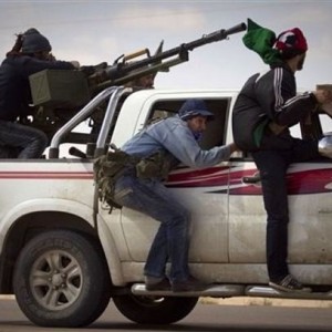 Libya_rebels_on_pickup_car_armed_with_machine_gun_001