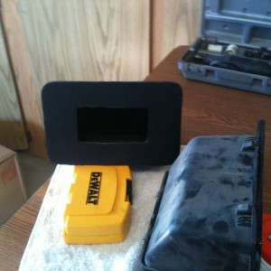Silicone epoxy sealing the plastic to the small cubbies in the bed 