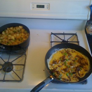 Sausage, mushroom, onion and pepper omelette with onion n pepper country po