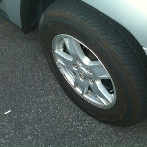 About to Change the tire, helping out a girl
