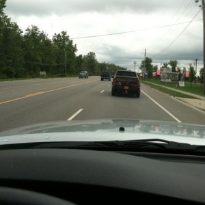 Plate says. 2 underpar. Lol I hunk it means golf. But it fits the ridgeline