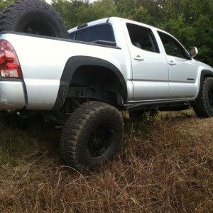 18" of wheel travel without shocks.