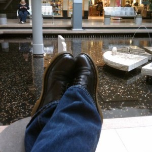 The wife and daughter are shopping at the mall. I wish the waitress would b