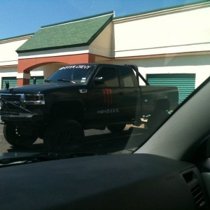 Its monster chevy! And yes thats a drink can where the antenna is.