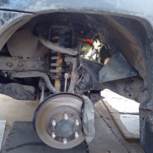 Block heater location through wheel well