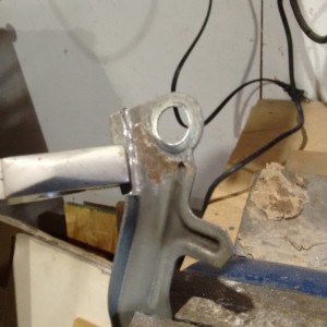 Partial tab removal on bracket