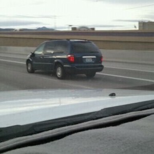He just got a tire tread thrown at his mirror.